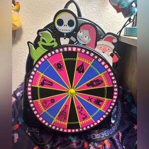 Disney Loungefly Nightmare Before Christmas Oogie’s Wheel.